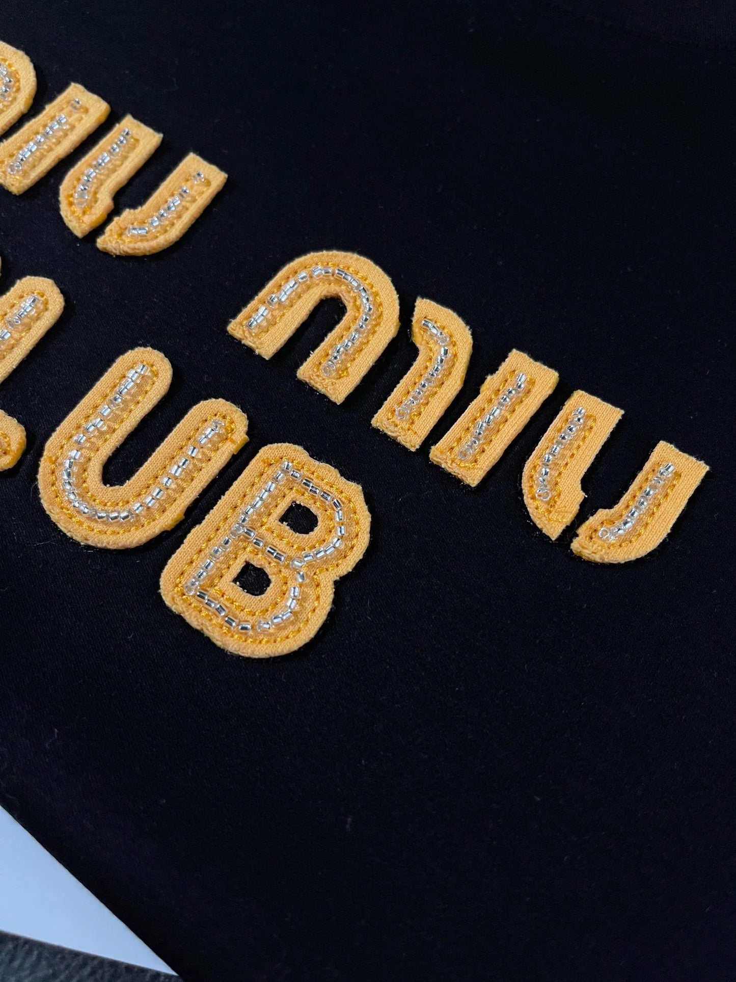MIUMIU TOPS