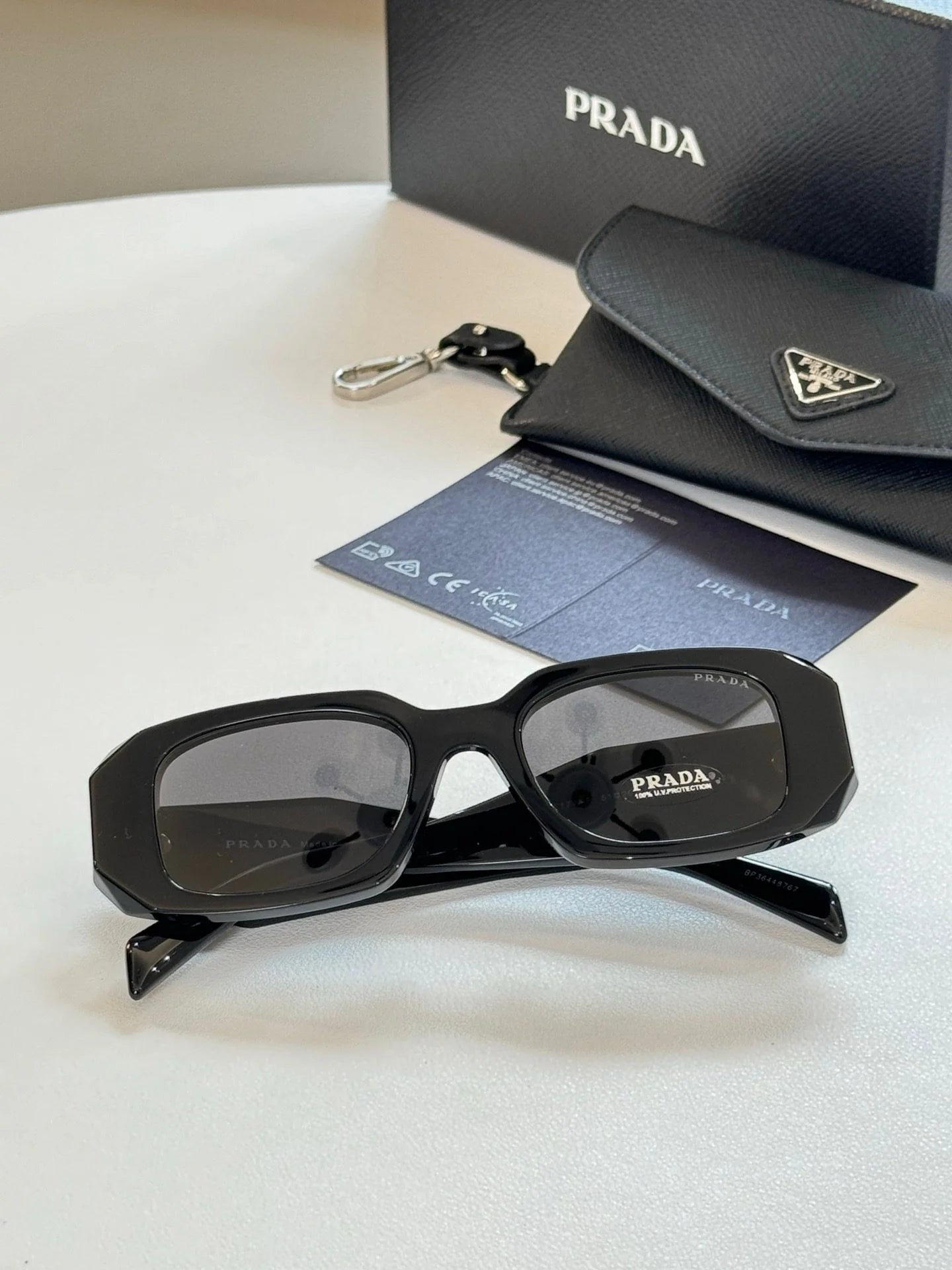 PRADA SUNGLASSES