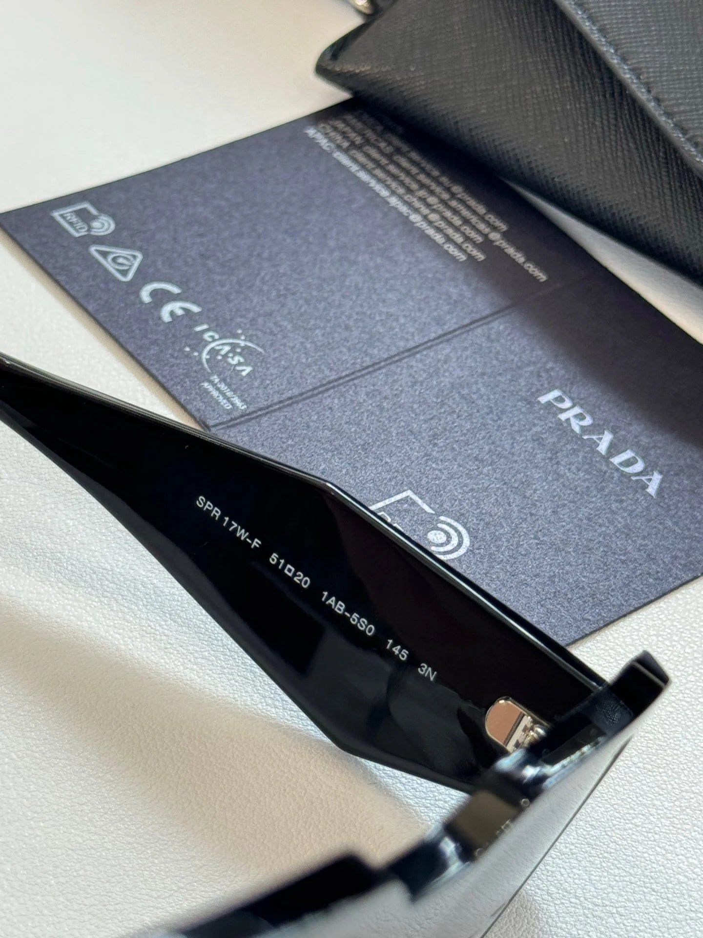 PRADA SUNGLASSES