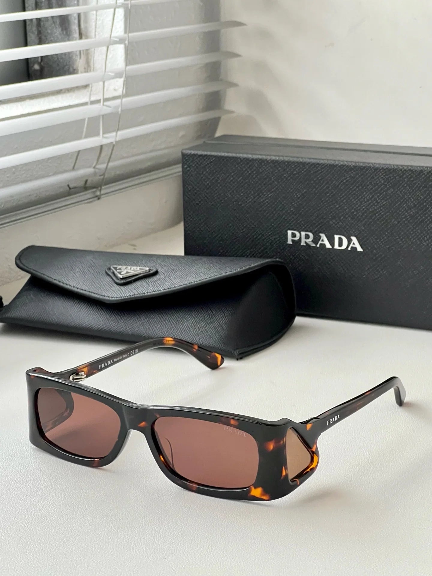 PRADA SUNGLASSES