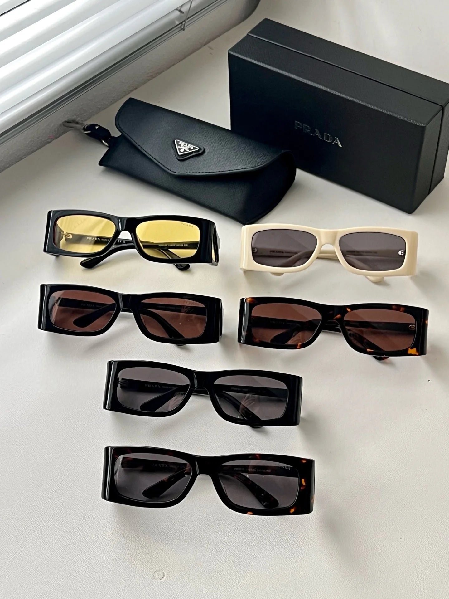 PRADA SUNGLASSES
