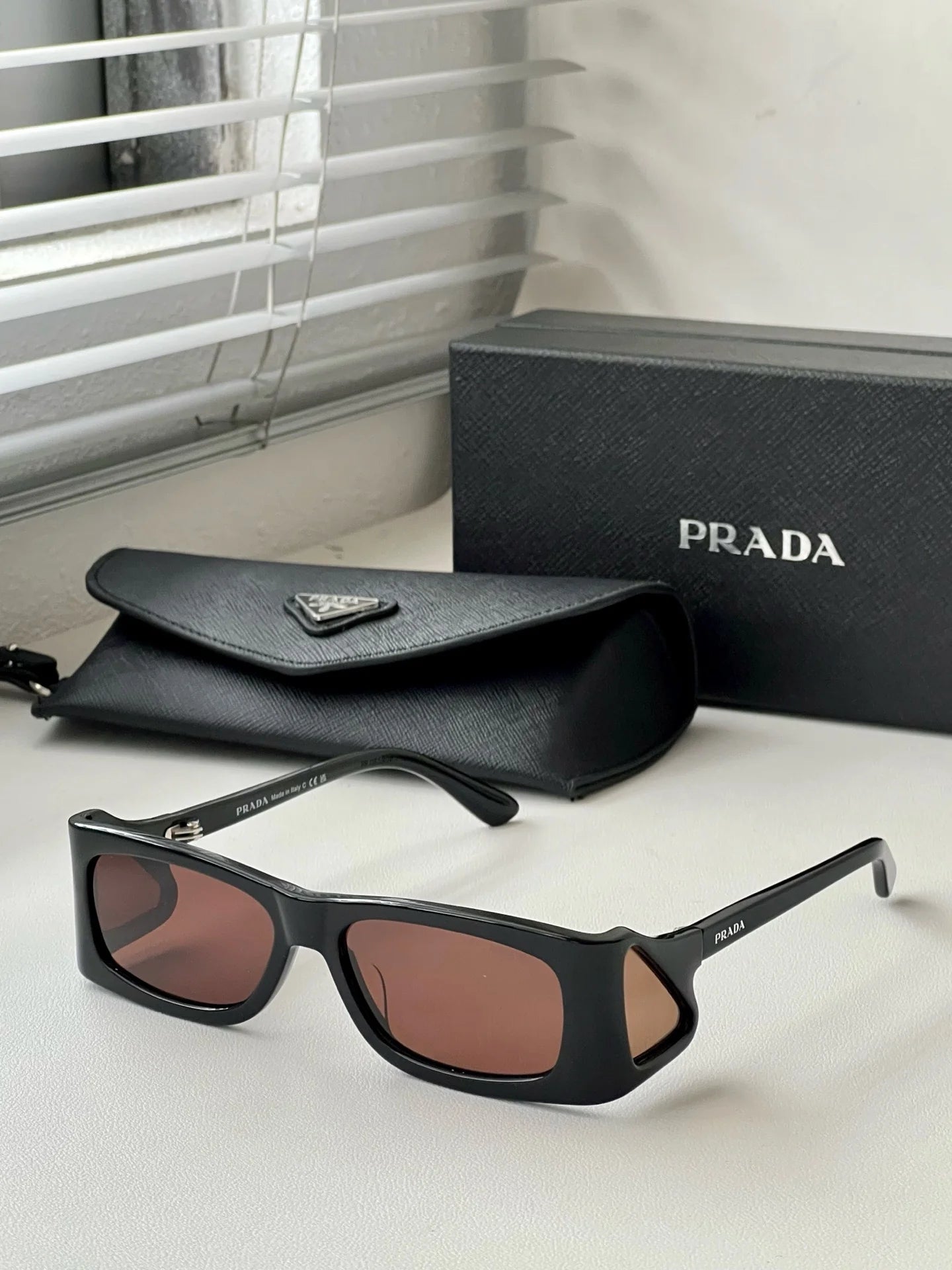 PRADA SUNGLASSES
