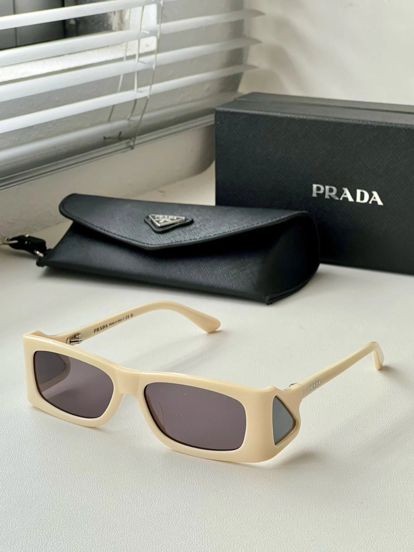 PRADA SUNGLASSES
