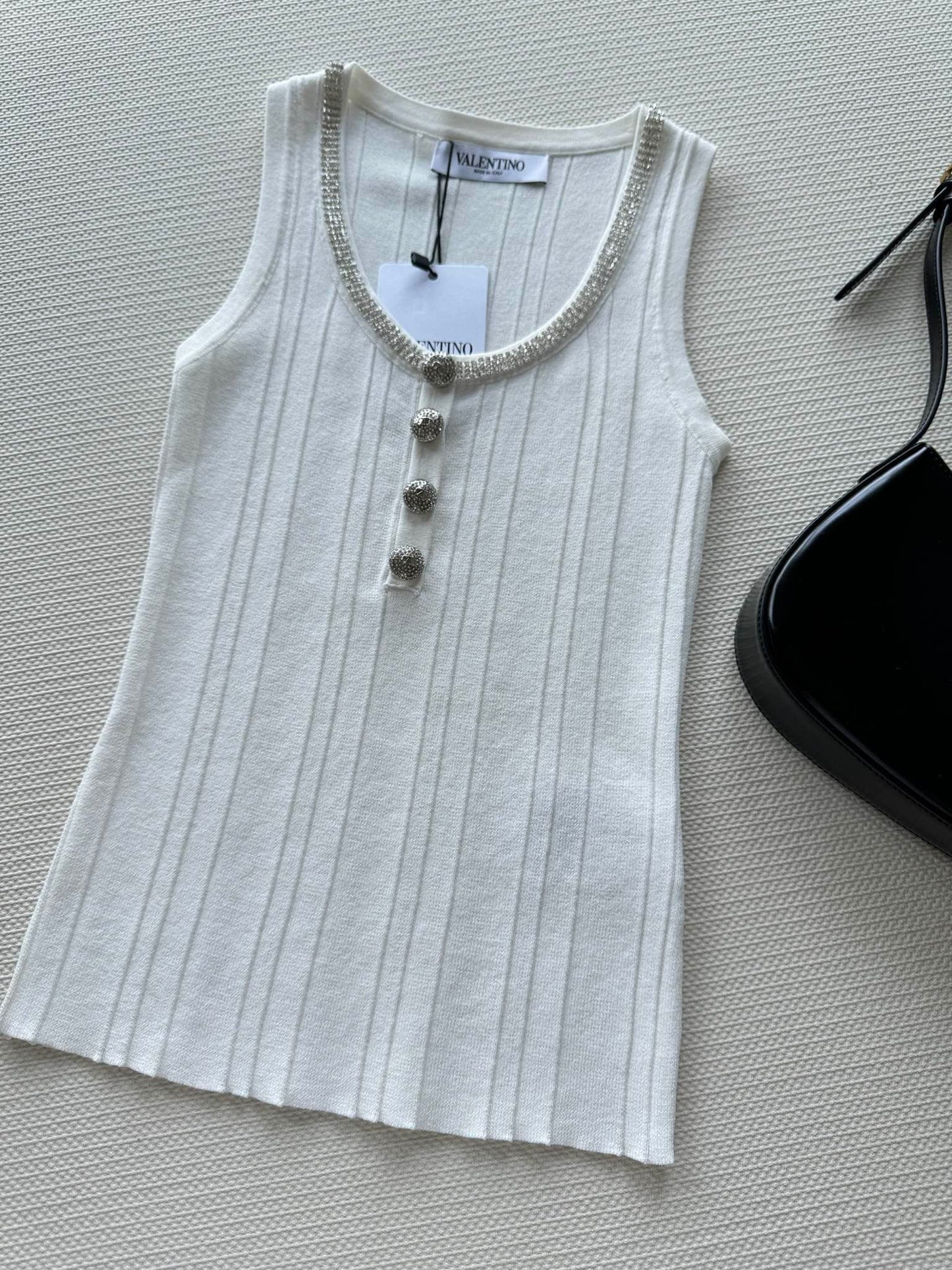 VLTN TOPS
