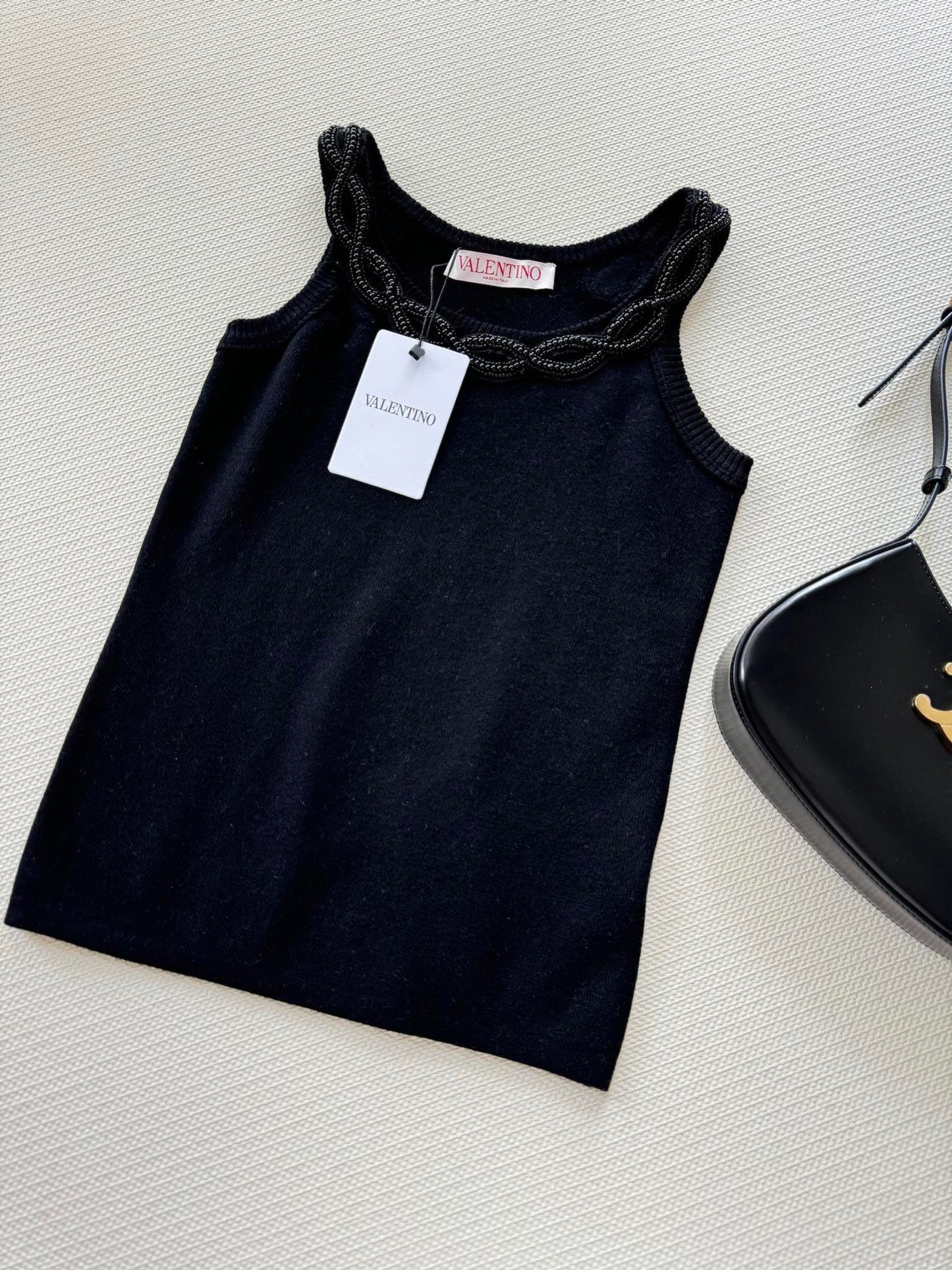 VLTN TOPS